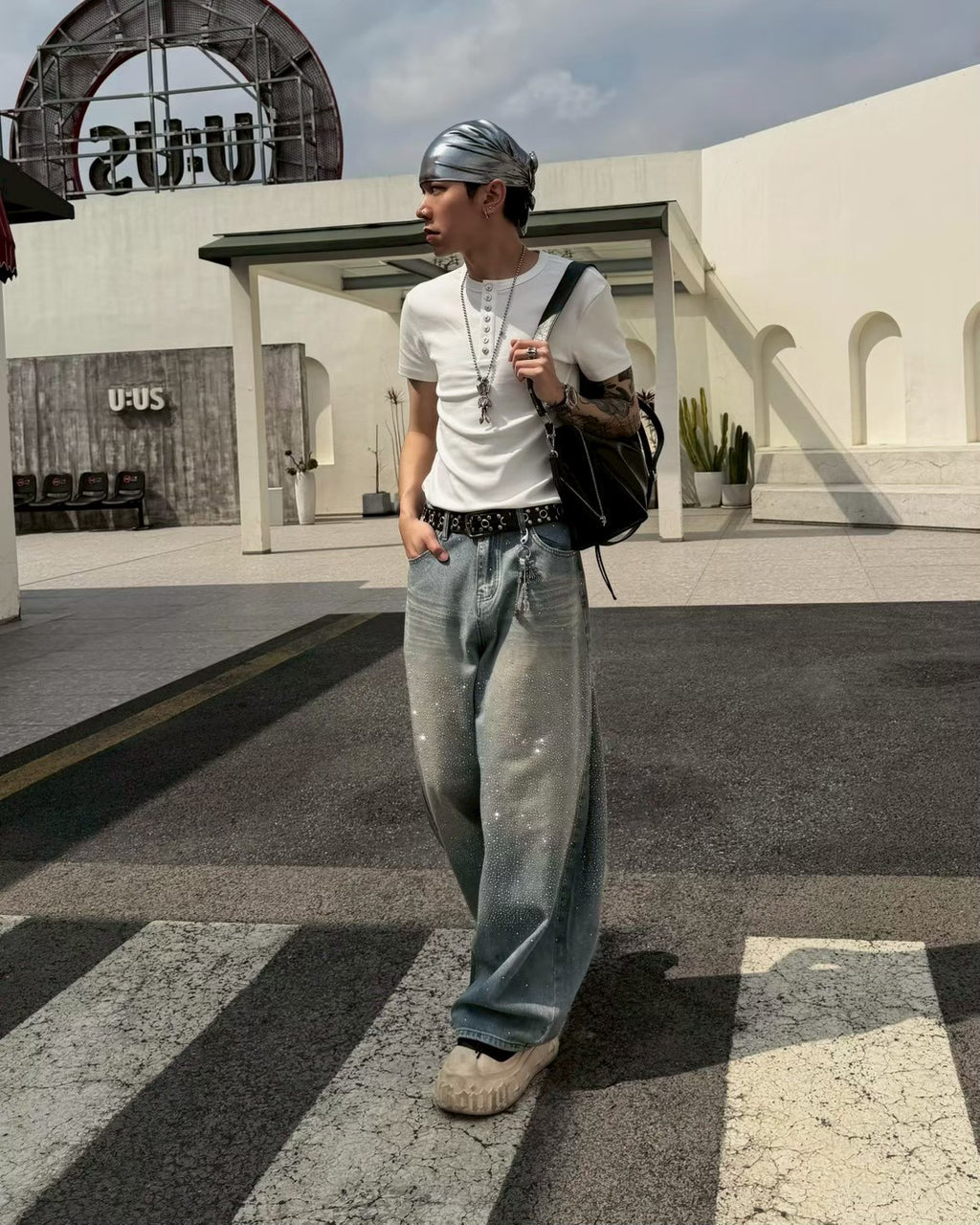 星辰燙鑽彎刀牛仔褲